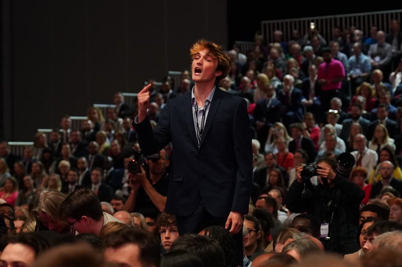 A heckler interrupts Chancellor of the Exchequer Rachel Reeves