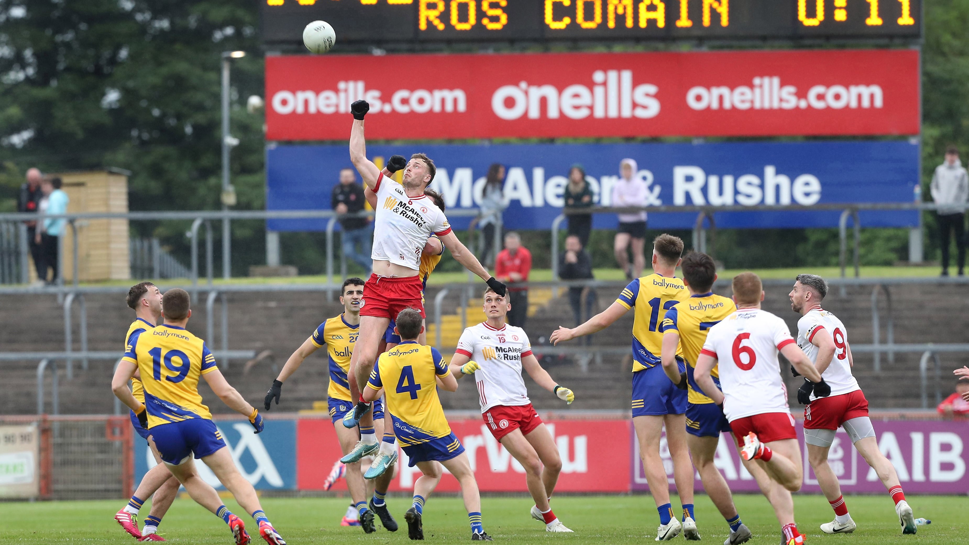 A high ball is contested between Tyrone and Roscommon
