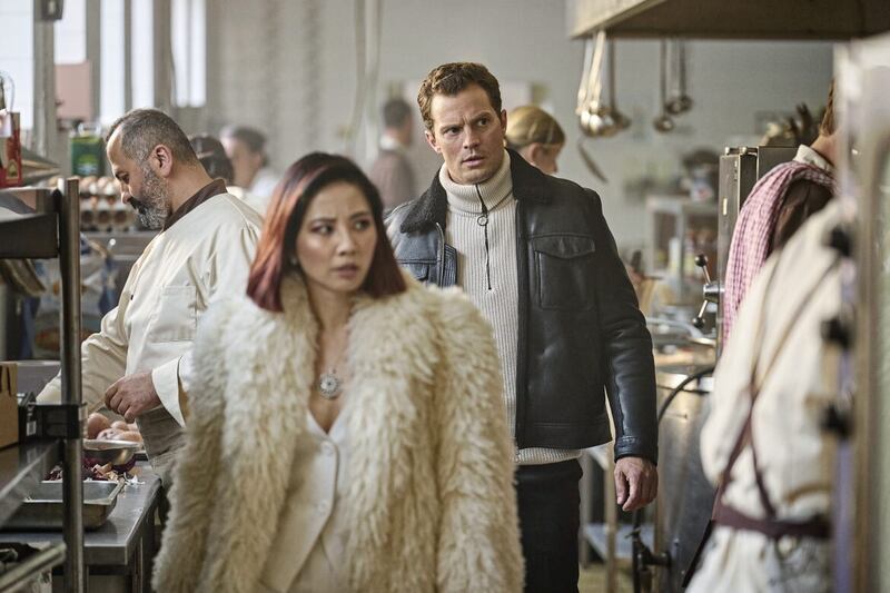 Jing Lusi as Yang and Jamie Dornan as Parker in Heart Of Stone. Picture by Robert Viglasky/Netflix 2023. 