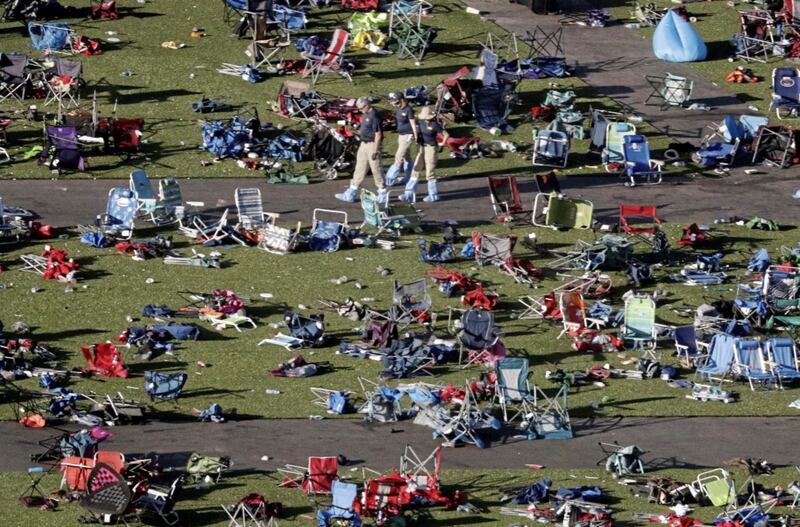 FBI agents continue to process evidence at the scene of a mass shooting in Las Vegas when Stephen Paddock opened fire on an outdoor music concert on Sunday killing dozens and injuring hundreds PICTURE: Gregory Bull/AP 