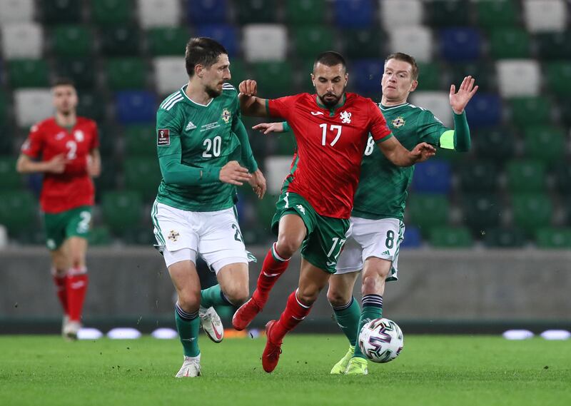 Northern Ireland’s Craig Cathcart and Bulgaria’s Georgi Yomov battle for the ball during the 2022 FIFA World Cup qualifying match in Belfast