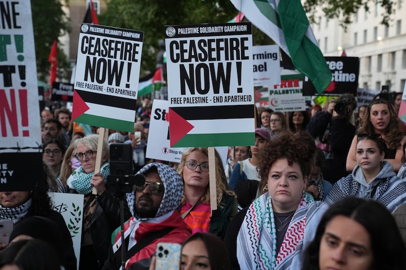 People taking part in a Palestine Solidarity Campaign rally on Whitehall in central London in September