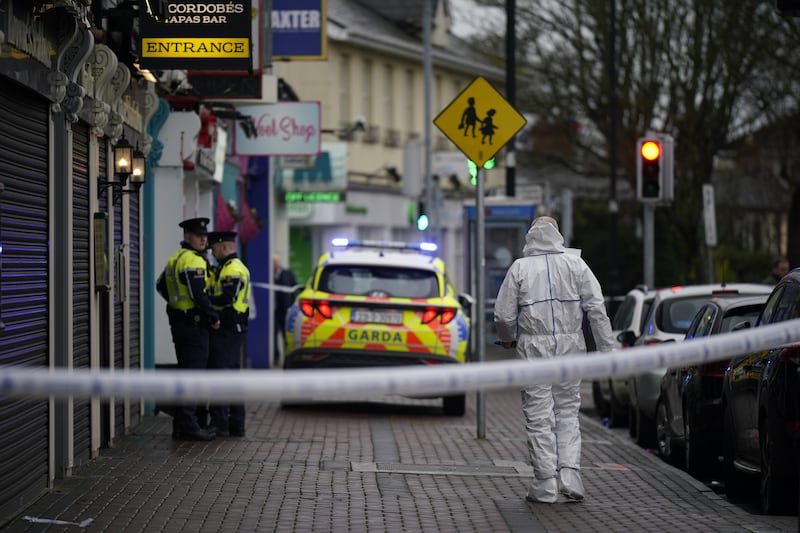 A forensic investigator at the scene in Blanchardstown, Dublin, after Tristan Sherry was shot dead at Browne’s Steakhouse