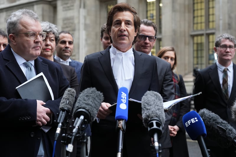 Lord Tom Watson and the Duke of Sussex’s barrister, David Sherborne, speak to the media after the legal action was settled on Wednesday