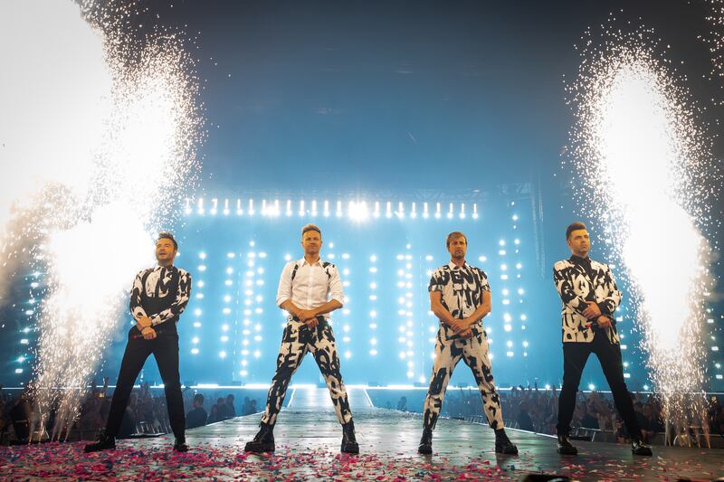 Westlife on stage at Wembley Stadium, London, during their sell-out show at the venue in 2022