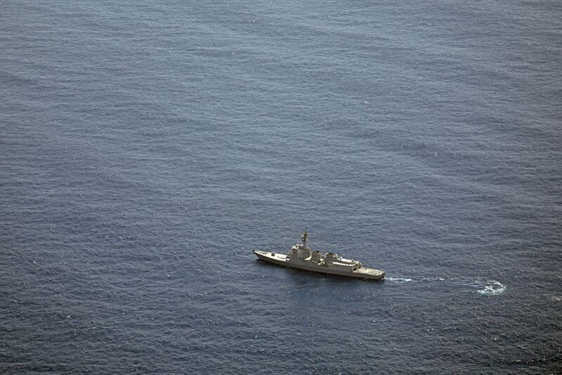 A search takes place near the site of a crash in the Pacific Ocean (Kyodo News via AP)