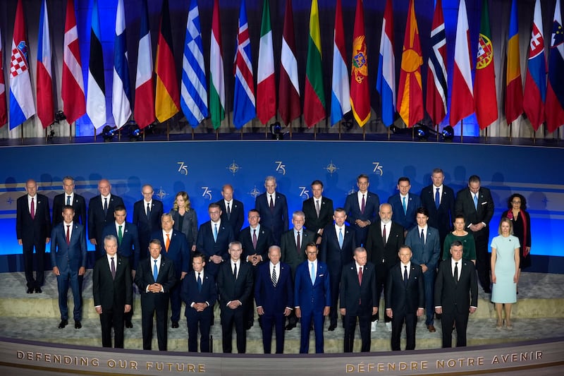 Nato leaders pose for a family photo before US President Joe Biden, front row centre, delivers remarks on Tuesday night