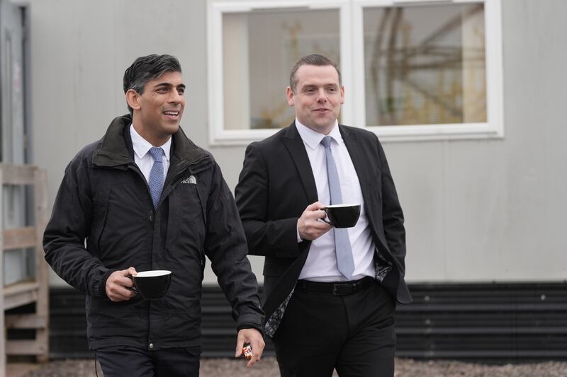Prime Minister Rishi Sunak (left) said he had enjoyed woring with Douglas Ross (right)