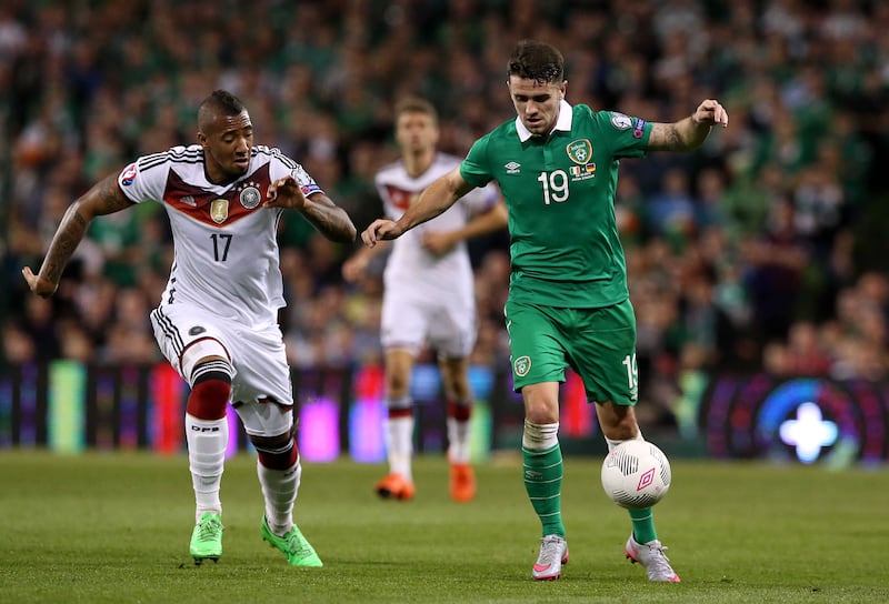 Republic of&nbsp;Ireland's Robert Brady and&nbsp;Germany's Jerome Boateng (left) battle for the ball at the Aviva Stadium