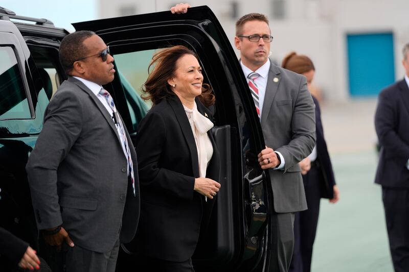 Democratic presidential nominee vice president Kamala Harris, centre, arrives to board Air Force Two at San Francisco International Airport (Julia Nikhinson/AP)