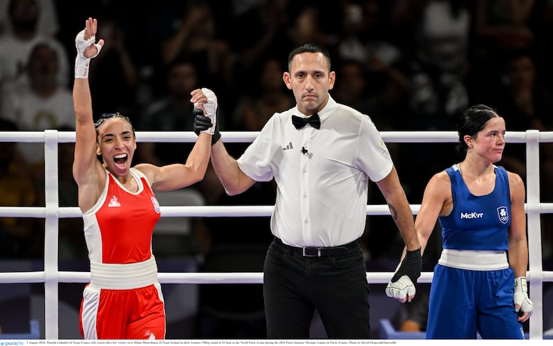 Daina Moorehouse turns away in disgust while Wassila Lkhadiri celebrates her controversial Olympic Games victory at North Paris Arena on Thursday. Picture by David Fitzgerald/Sportsfile