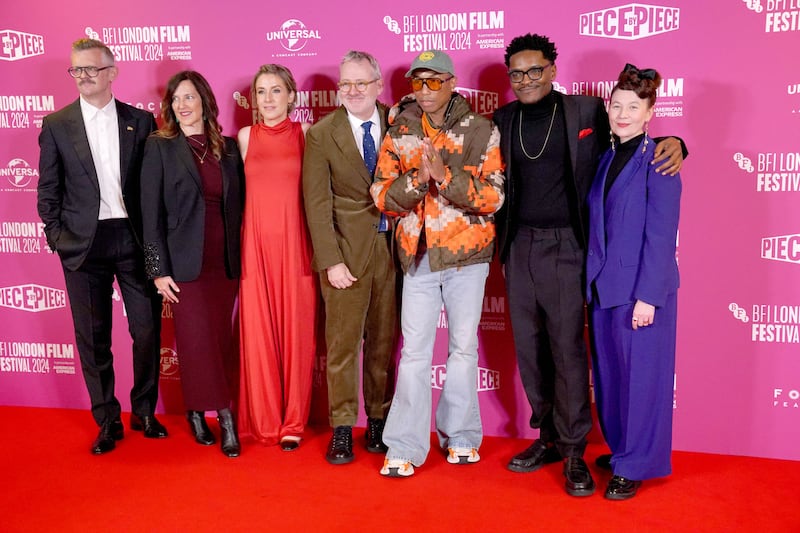 (left to right) Ben Roberts, Jill Wilfert, Caitrin Rogers, director Morgan Neville, Pharrell Williams, Brent Palmer and Kristy Matheson attend the BFI London Film Festival closing gala screening of Piece By Piece at the Royal Festival Hall in London