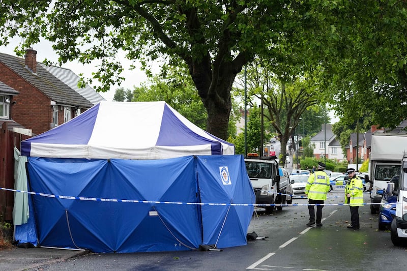 West Midlands Police at the scene of the fatal shooting in Well Lane, Blakenhall, on Tuesday