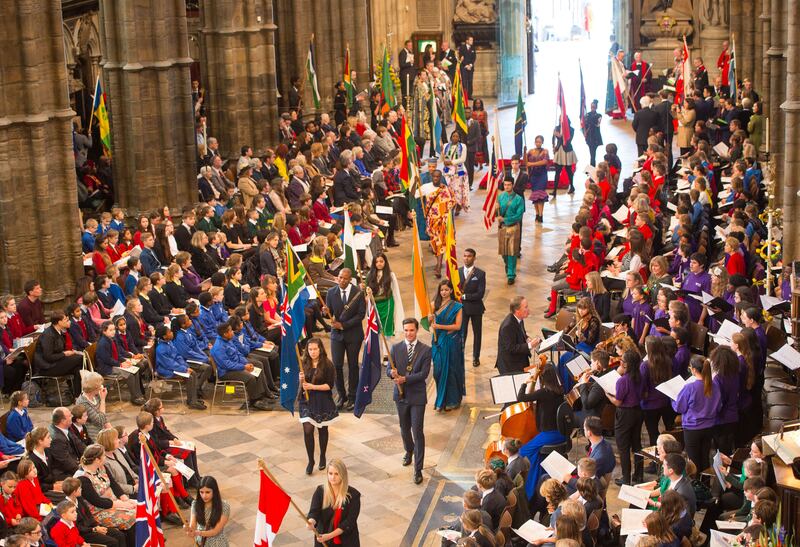 Flag bearers carry the flags of the Commonwealth nations during the service in 2017
