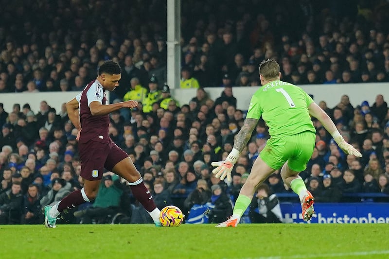 Aston Villa’s Ollie Watkins (left) scores the winner against Everton at Goodison Park