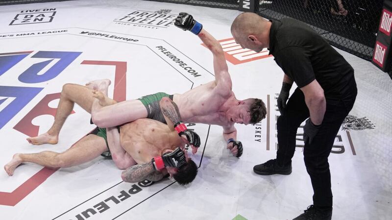 Dylan Tuke wrestles with Connor Hughes in lightweight contest in July. Picture: Billy Cleary PFL Europe 