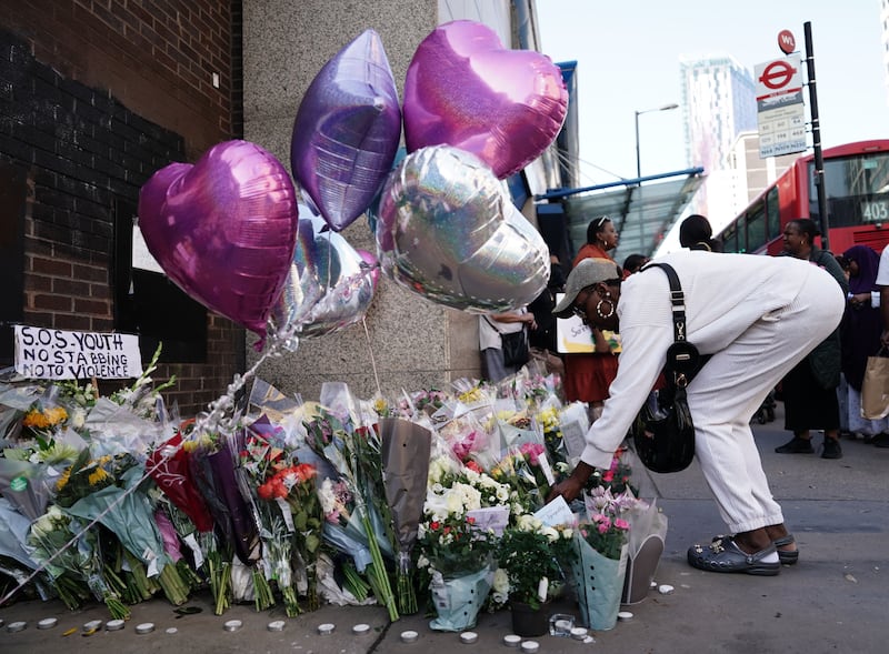 Flowers and tributes at the scene in Croydon, south London, where Elianne Andam died