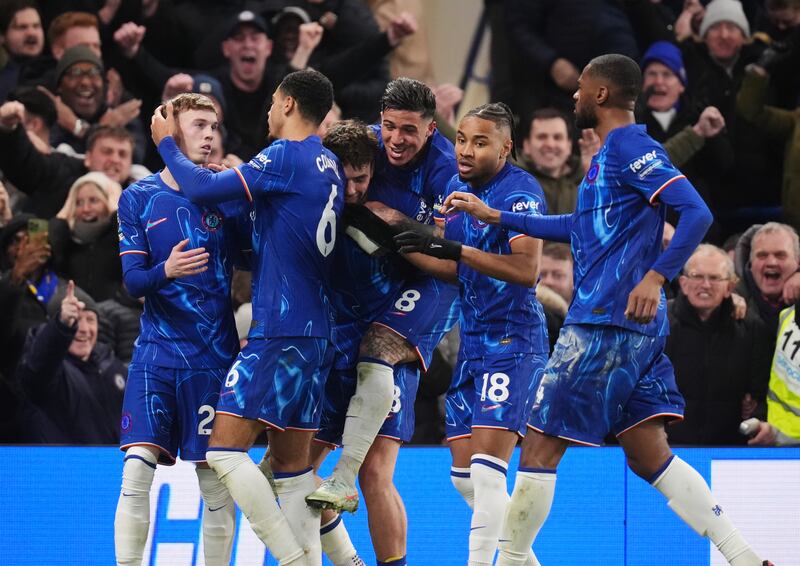 Cole Palmer celebrates after his shot led to an own goal by Aaron Wan-Bissaka