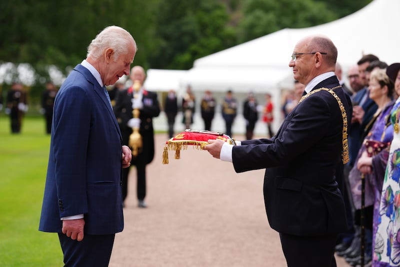 The King receives the keys to the City of Edinburgh from Lord Provost Robert Aldridge at the Palace of Holyroodhouse
