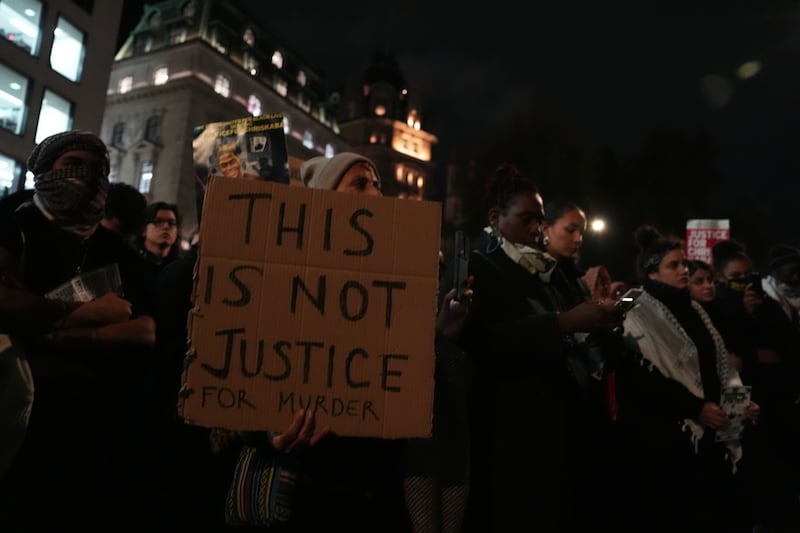 Demonstrators held signs that read ‘This is not justice’ as they protested against the acquittal of a police marksman