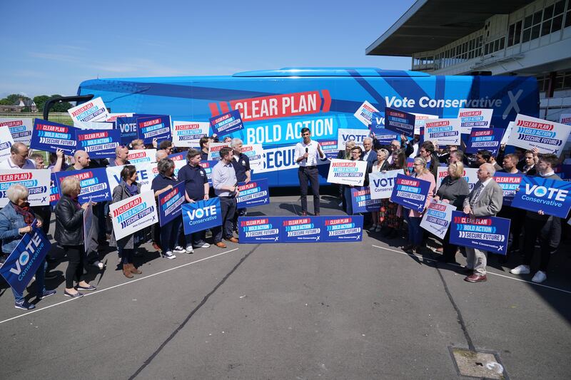 Party supporters held aloft placards and a 2000s indie/pop soundtrack played as Prime Minister Rishi Sunak arrived at Redcar Racecourse