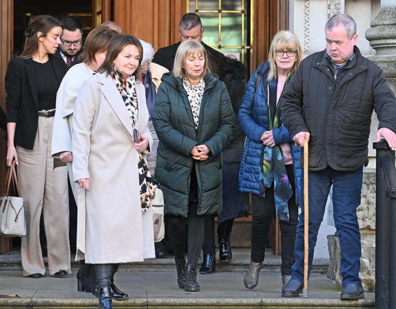 Families of the 'Clonoe Four' leave the Coroner's Court in Belfast with their legal representatives following the report of findings into the deaths of four provisional IRA members shot dead in an SAS ambush at Clonoe, near Coalisland in County Tyrone in February 1992.