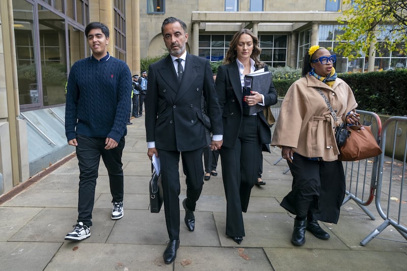 Solicitor Aamer Anwar (second left) arrives at Capital House, Edinburgh, for the inquiry