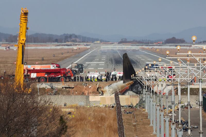 Relatives of the 179 people killed in the plane crash visit the site at Muan International Airport to pay their respects (Lee Jin-wook/Yonhap/AP)