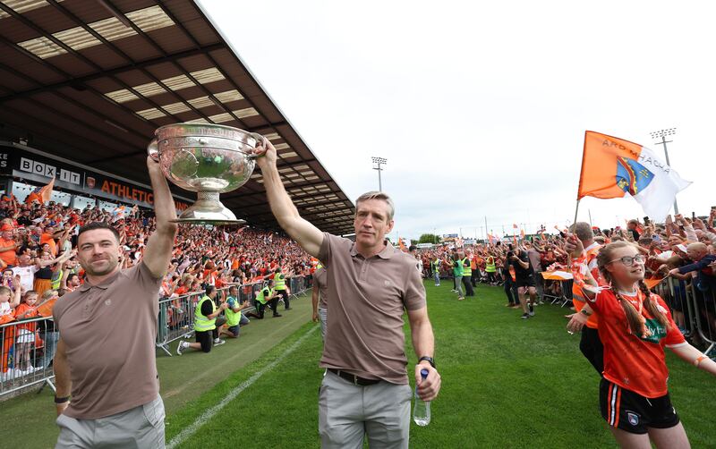 Armagh celebrate  with the fans at the Athletic grounds in Armagh on Monday, after winning the All Ireland.
PICTURE COLM LENAGHAN