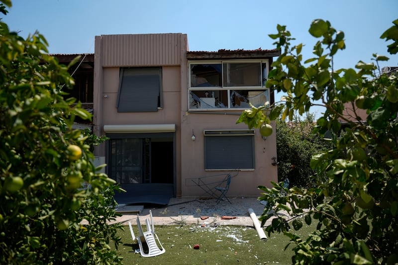 A damaged house is seen following an attack from Lebanon, in Acre, north Israel on Sunday (Ariel Schalit/AP)