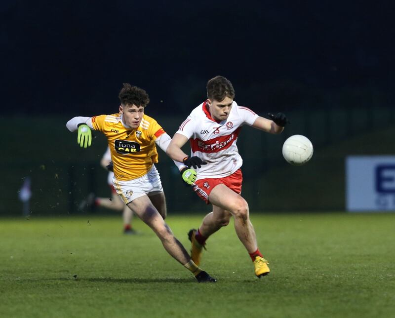 Derry&rsquo;s Charlie Diamond and Cahir Donnelly of Antrim in action during last night&rsquo;s Eirgrid Ulster U20 Football Championship quarter-final at Owenbeg.&nbsp;<br />&nbsp;Picture: Margaret McLaughlin