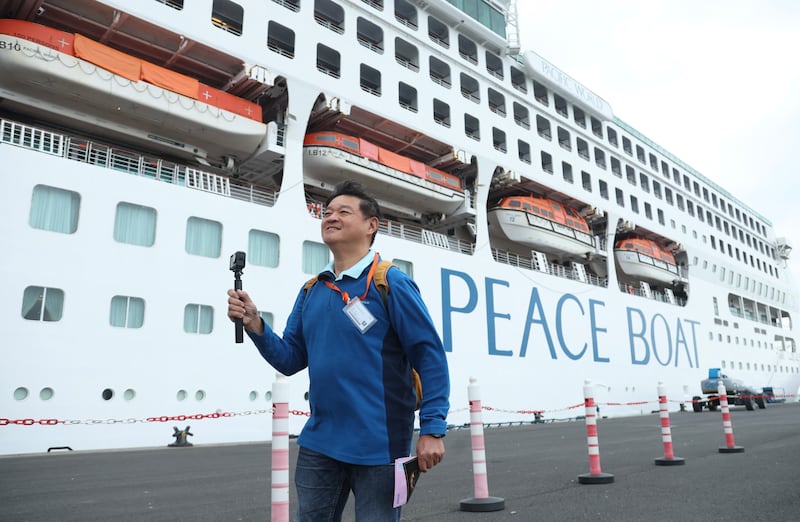 Passengers dock in Belfast on Saturday on the Peace Boat.
PICTURE COLM LENAGHAN