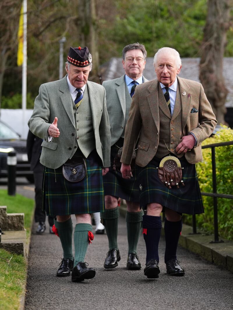 The King (right) arrives for a visit to the Gordon Highlanders Museum in Aberdeen