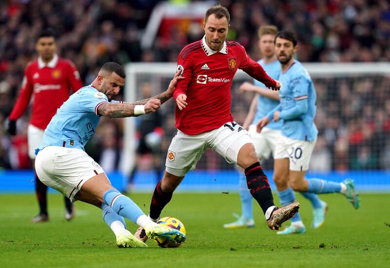 Manchester United’s Christian Eriksen (right) and Manchester City’s Kyle Walker battle for the ball during a Premier League match.