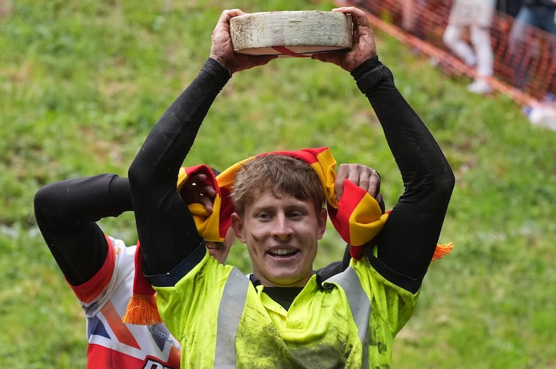 Tom Kopke celebrates winning the 1st men’s downhill race