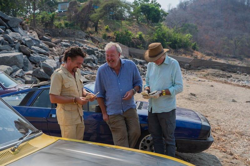 Hammond, Clarkson and May plotting their next move in a scene from The Grand Tour: One For The Road