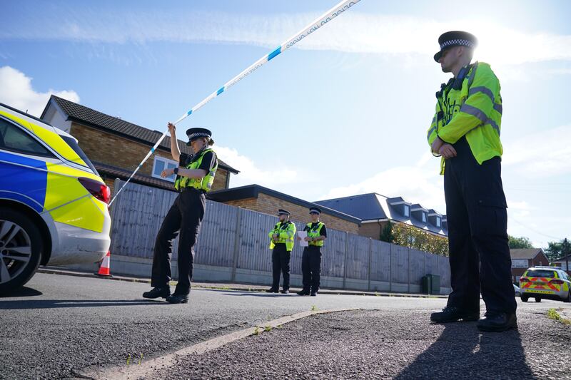 Police officers at the scene in Ashlyn Close, Bushey, Hertfordshire