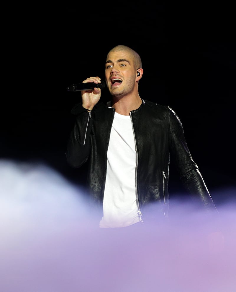 Max George on stage during the 2012 Capital FM Jingle Bell Ball