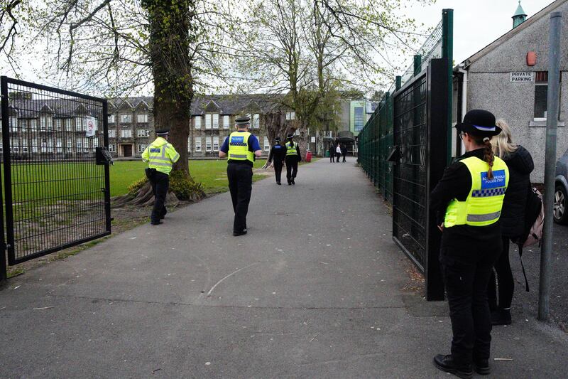 Police officers outside Amman Valley School in Ammanford, Carmarthenshire, in April
