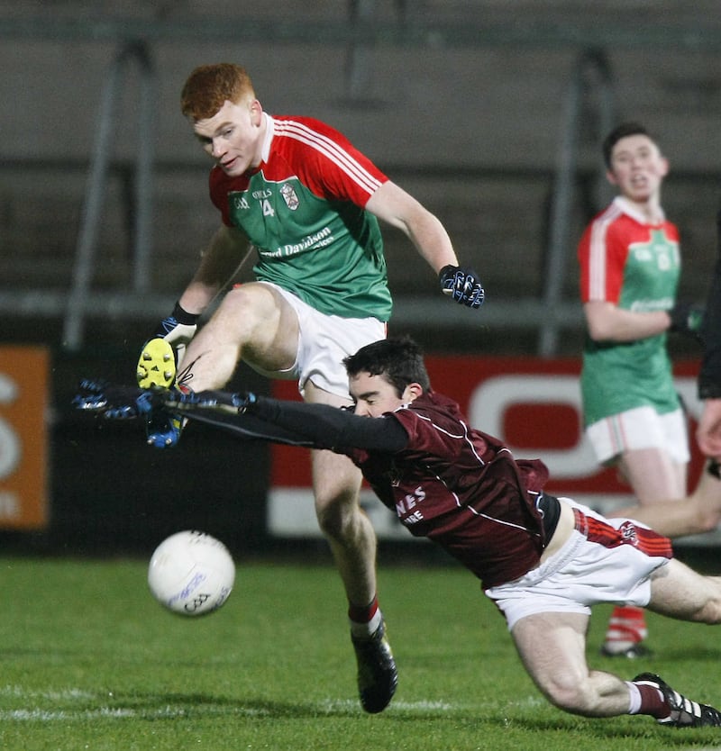 Declan Loye of St Paul&rsquo;s, Bessbrook blocks Jason Duffy&rsquo;s shot for St Patrick&rsquo;s, Armagh at the Athletic Grounds on Wednesday night<span class="Apple-tab-span" style="white-space: pre;">		<br /></span>Picture: Jim Dunne&nbsp;