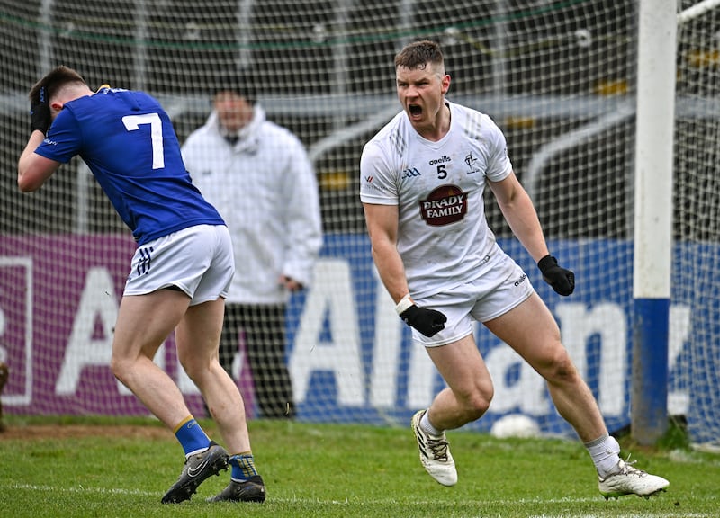 Jack Sargent of Kildare celebrates after scoring a late point to win the game as Gavin Fogarty of Wicklow reacts during the Leinster GAA Football Senior Championship quarter-final