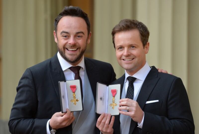 TV presenters Ant and Dec after they were presented with OBEs by the Prince of Wales during an investiture ceremony at Buckingham Palace, London. Photo credit should read: John Stillwell/PA Wire