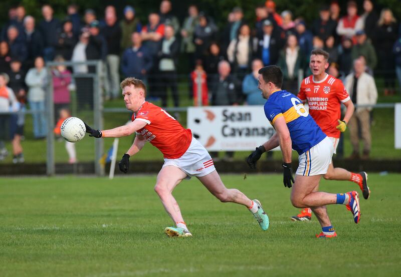 Clann Eireann’s Conor Turbitt and Maghrey’s Aidan Forker during Saturday’s Championship game in Maghery.
PICTURE COLM LENAGHAN