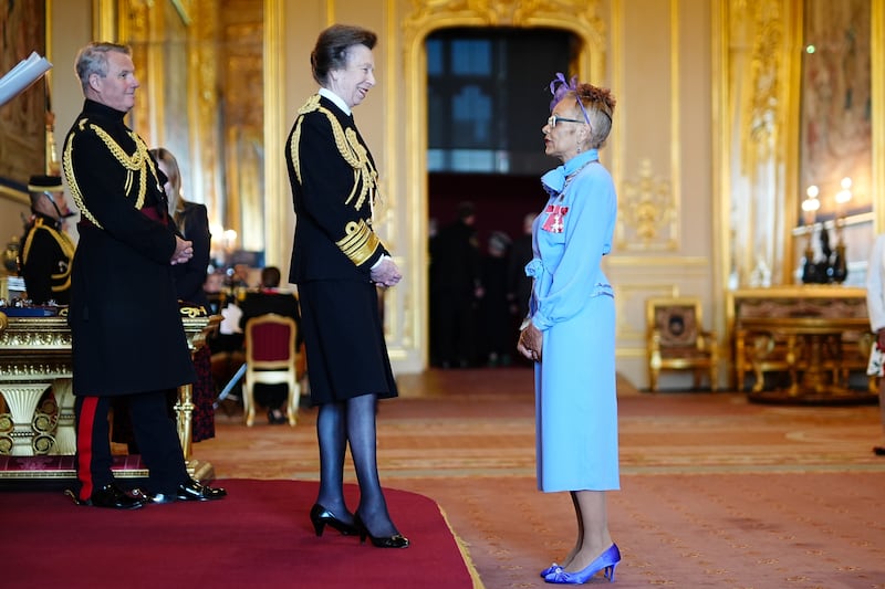 Anita Neil speaks to the Princess Royal at her investiture