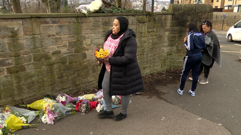 Sophia Dawson leaves flowers at the scene