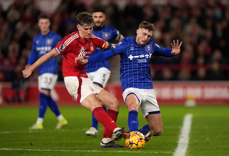 Nottingham Forest’s Ryan Yates, left, was among the Premier League captains to wear a rainbow armband at the weekend