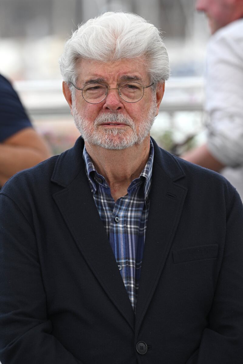George Lucas attends a photocall as he has been awarded an Honorary Palme d’Or during the 77th Cannes Film Festival in Cannes, France