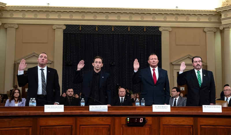 From left, Sgt Edward Lenz, Commander of Butler County Emergency Services Unit, Patrolman Drew Blasko of Butler Township Police Dept, Lt John Herold of Pennsylvania State Police, and former US Secret Service agent Patrick Sullivan, were among those to give evidence at the first public hearing (Ben Curtis/AP)