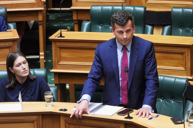 David Seymour stands during the first debate on the Treaty Principles Bill in parliament in Wellington, New Zealand (Charlotte Graham-McLay/AP)