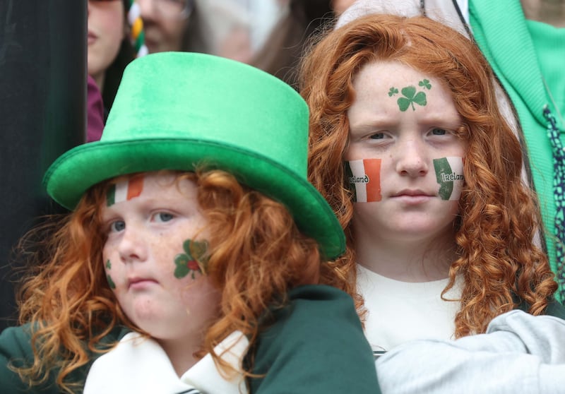 Performers entertain the crowd as  Thousands line the streets for the St Patrick’s day Parade in Belfast on Sunday.
PICTURE COLM LENAGHAN